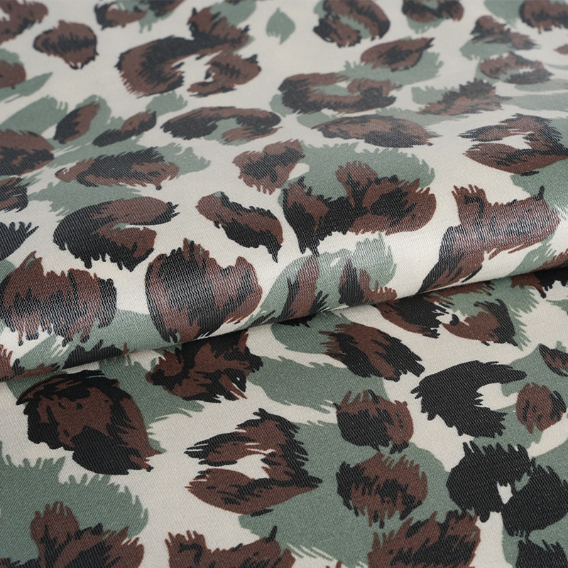 20D*21S Verdickter goldener Baumwollstoff in drei Farben mit Leopardenmuster